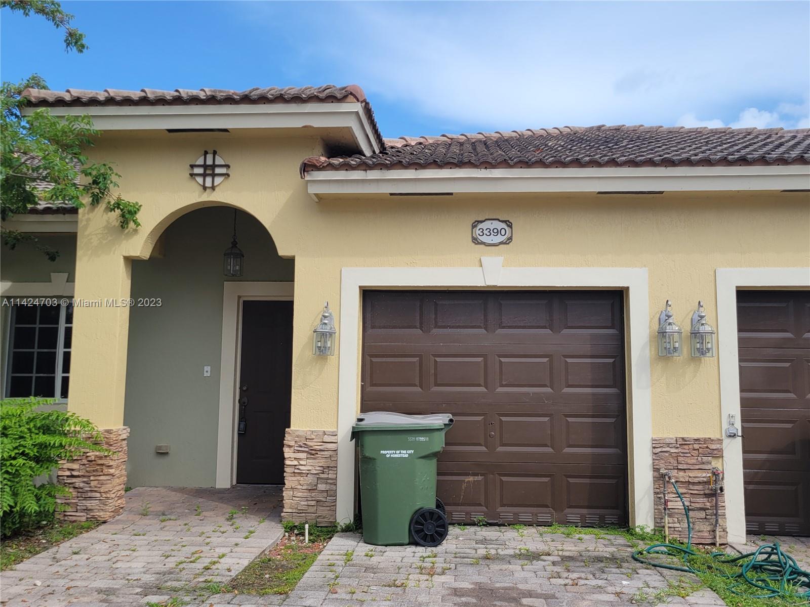 3390 Northeast 11th Drive, Unit 3390 Homestead, FL 33033 - Photo 2 of 20 a view of a entryway door of the house