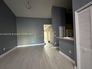 3390 Northeast 11th Drive, Unit 3390 Homestead, FL 33033 - Photo 4 of 20 a view of an empty room with a window