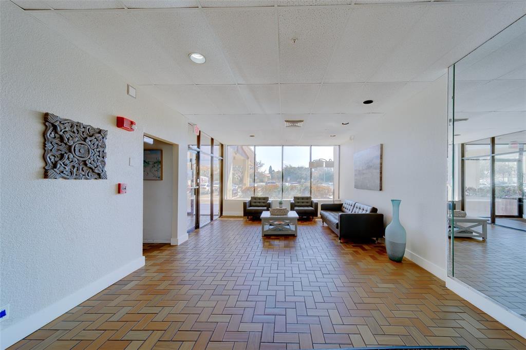 255 Dolphin Point, Unit 802 Clearwater Beach, FL 33767 - Photo 36 of 41 a living room with furniture