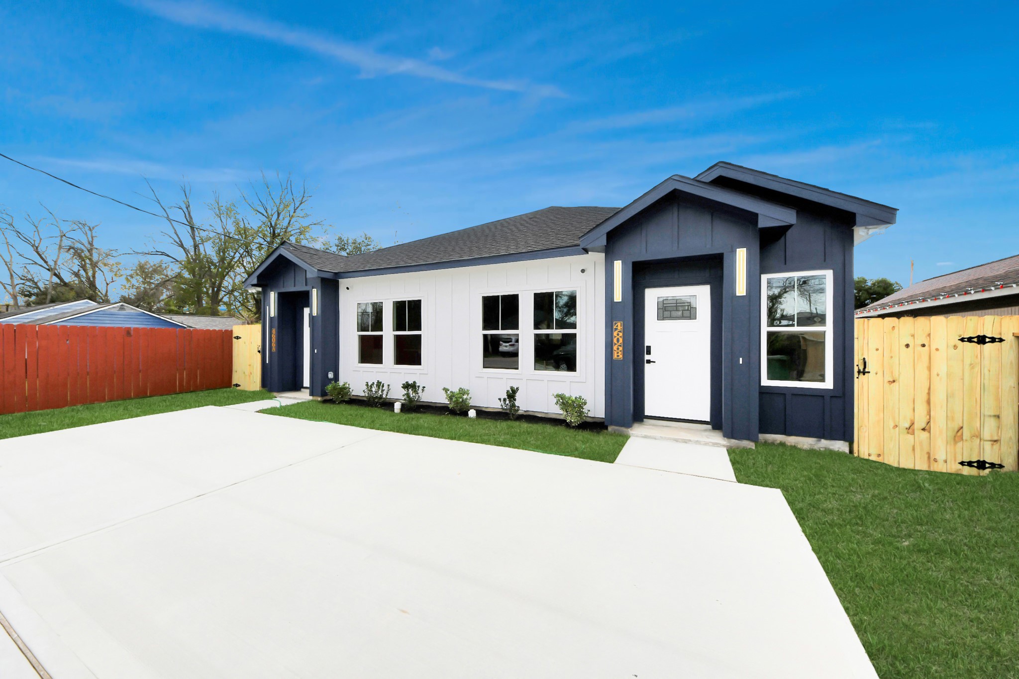 4606 Mallow Street Houston, TX 77051 - Photo 2 of 31 a front view of a house with a yard