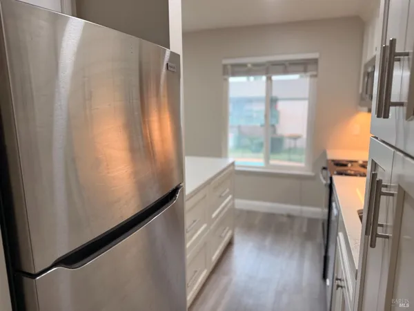 a view of walk in closet with window
