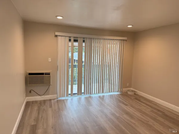 wooden floor and windows in an empty room