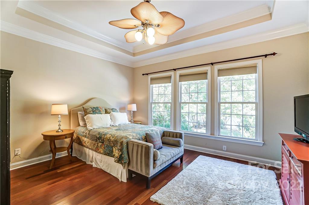 146 Mills Lane Fort Mill, SC 29708 - Photo 29 of 48 a bedroom with a bed and a flat screen tv