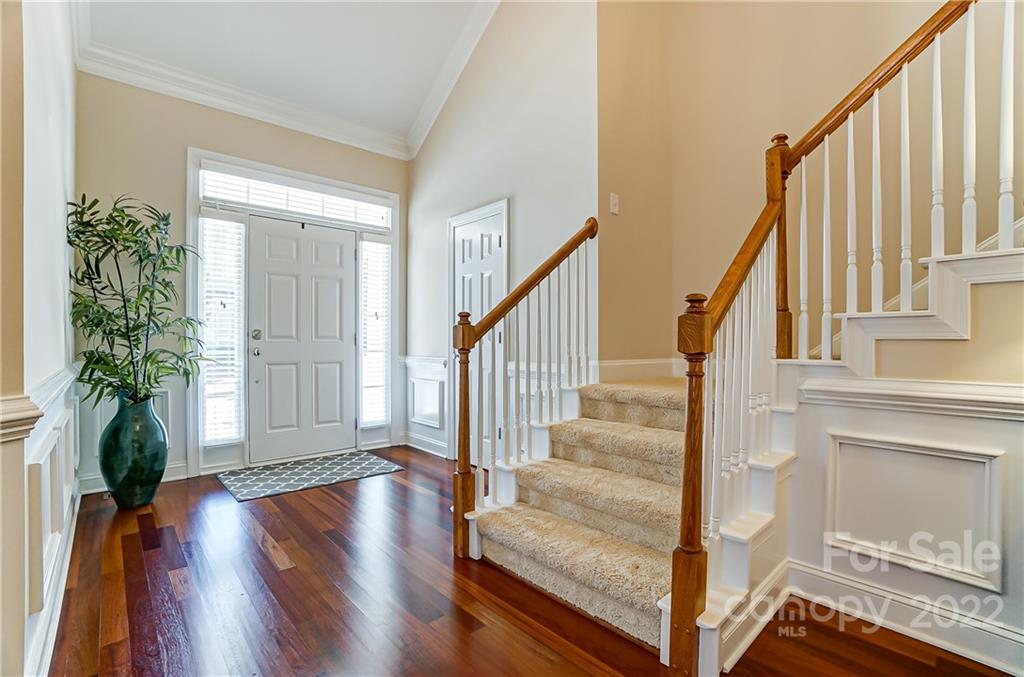146 Mills Lane Fort Mill, SC 29708 - Photo 6 of 48 a view of entryway with wooden floor and front door