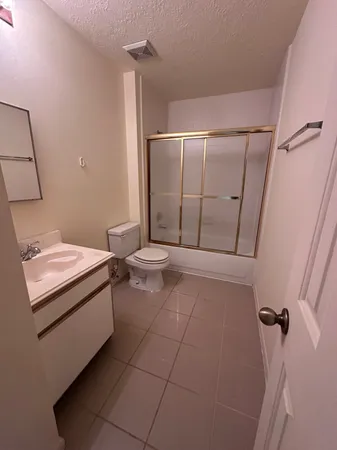 a kitchen with stainless steel appliances a sink and a counter top space