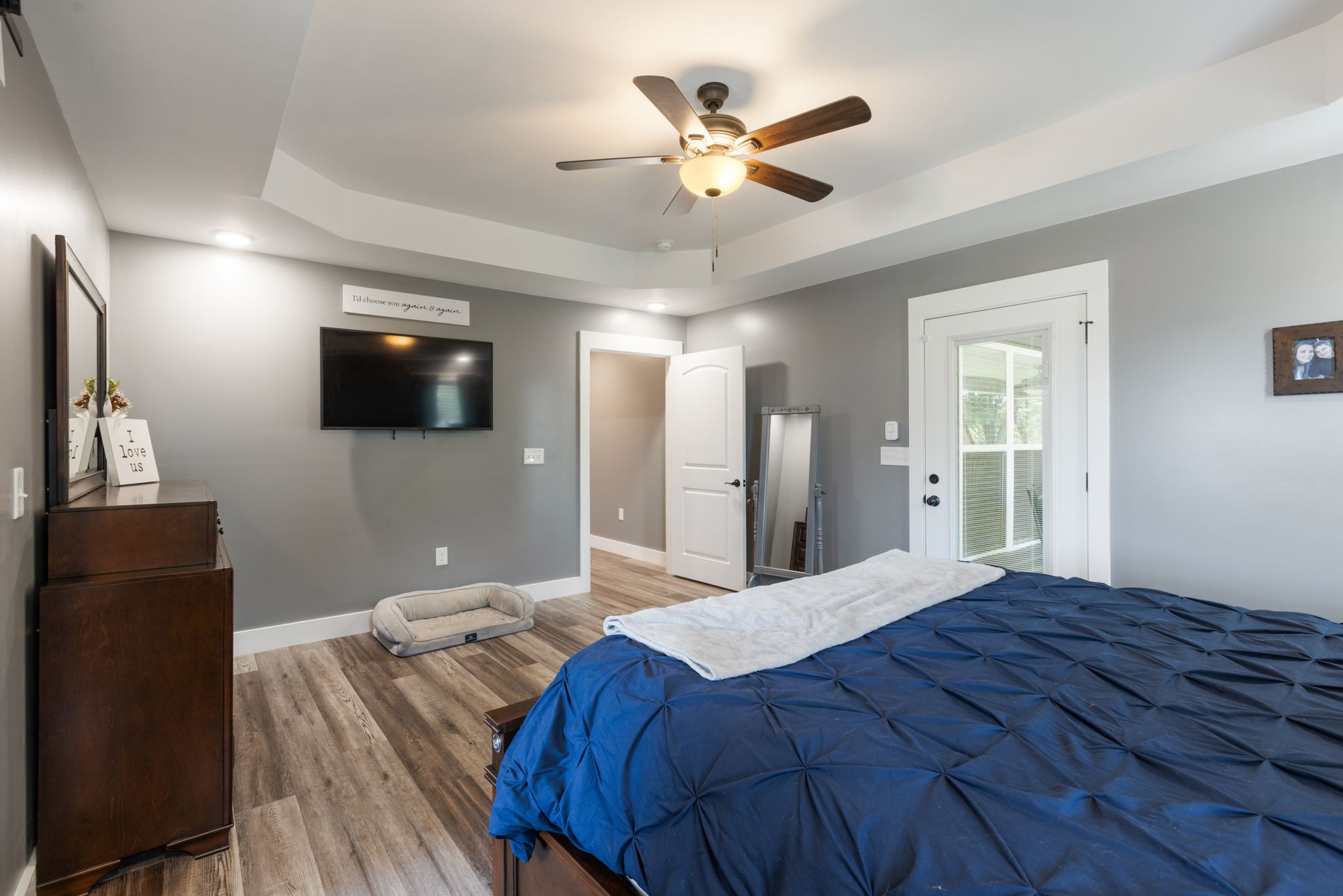 3030 Cherry Corner Road Cornersville, TN 37047 - Photo 26 of 66 a bedroom with a bed and a flat screen tv