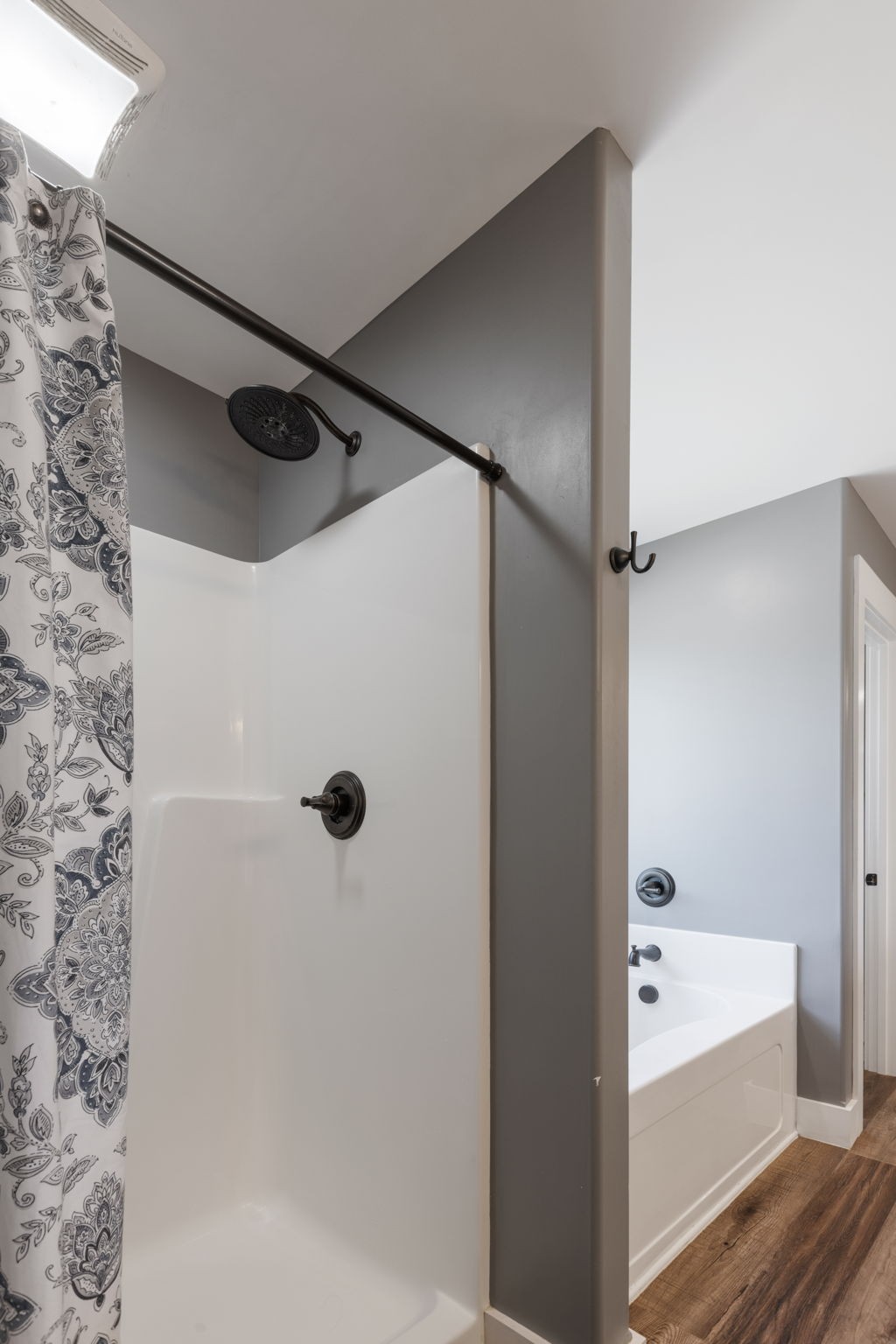 3030 Cherry Corner Road Cornersville, TN 37047 - Photo 30 of 66 a bathroom with a shower and a bath tub