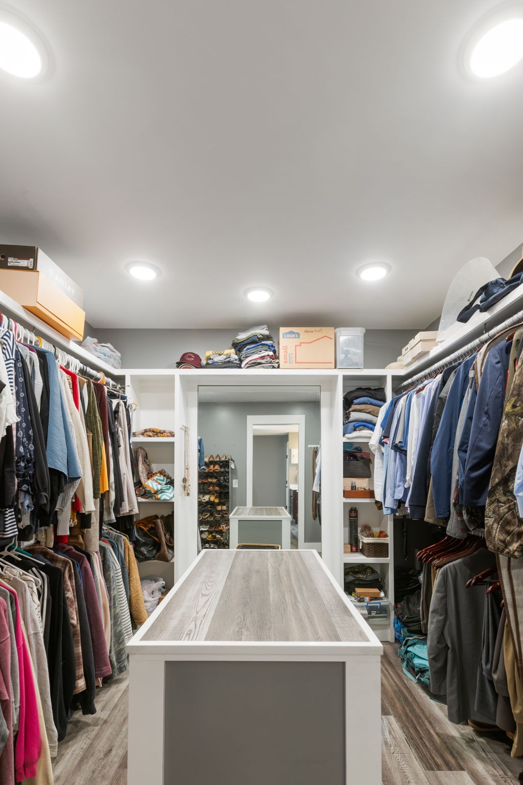 3030 Cherry Corner Road Cornersville, TN 37047 - Photo 31 of 66 a view of walk in closet with clothes and shoes