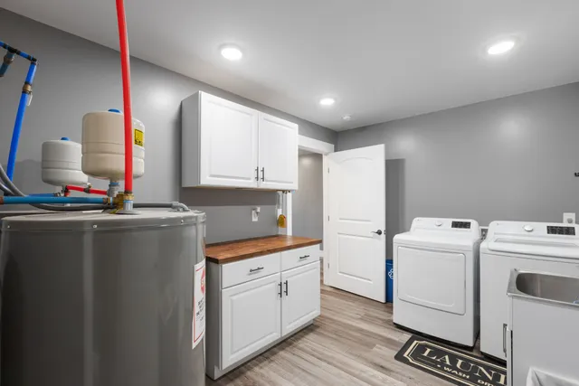 a view of a porch with furniture and a yard