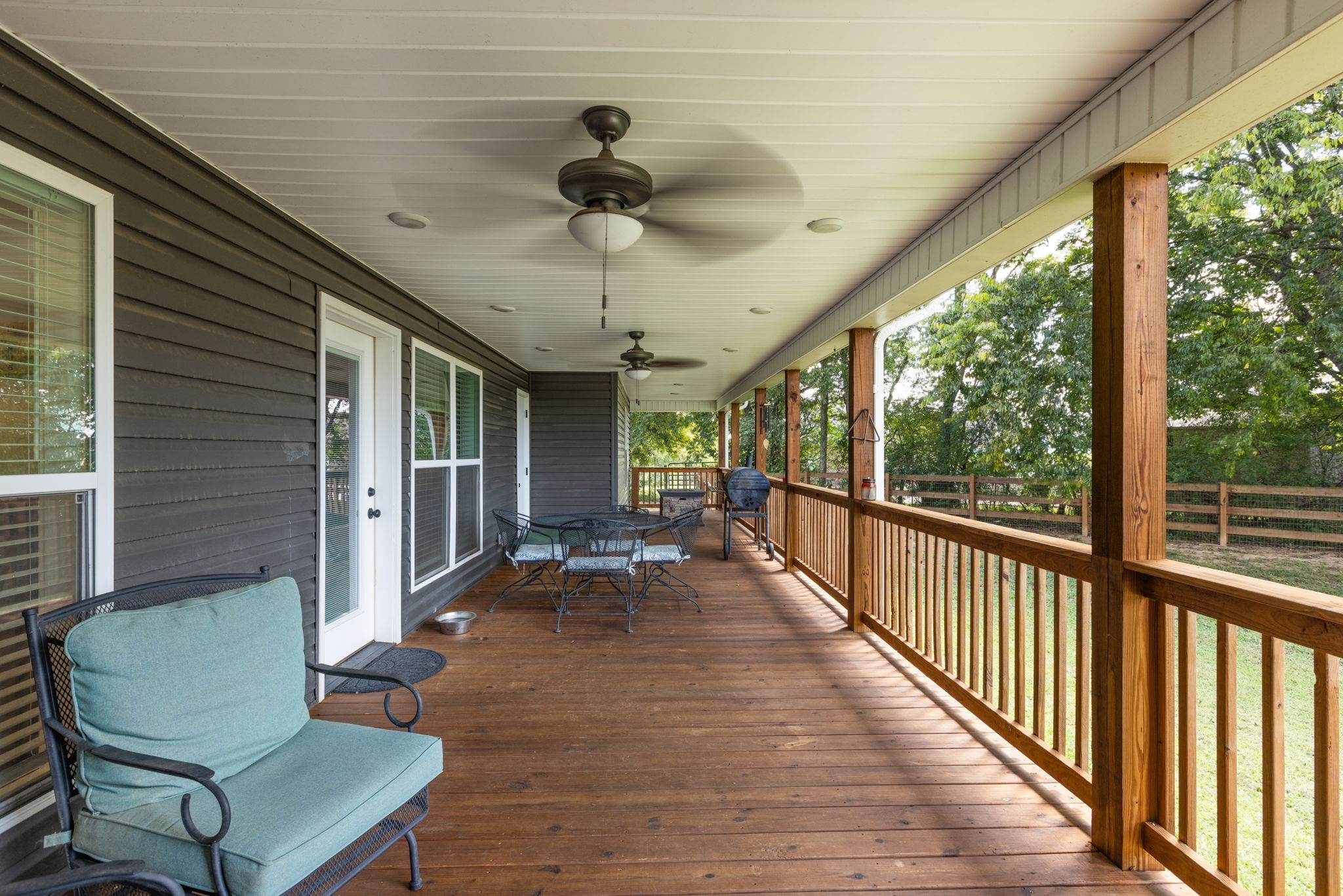 3030 Cherry Corner Road Cornersville, TN 37047 - Photo 47 of 66 a view of a porch with furniture and a yard