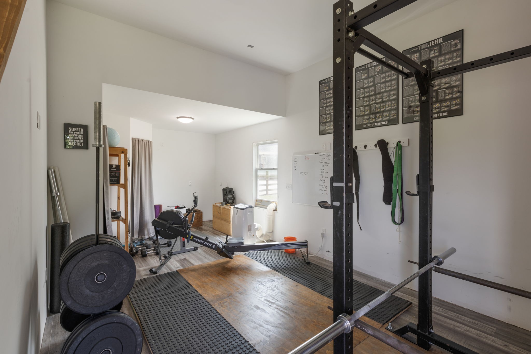 3030 Cherry Corner Road Cornersville, TN 37047 - Photo 54 of 66 a living room with furniture a rug and white walls