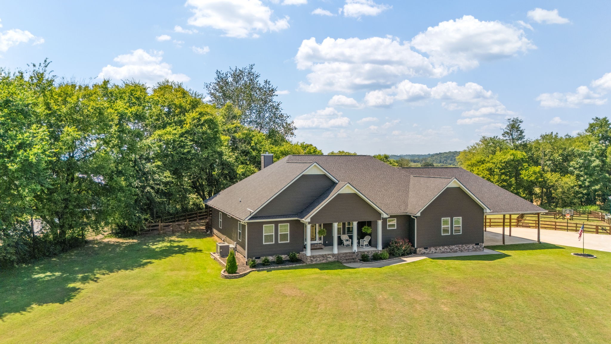3030 Cherry Corner Road Cornersville, TN 37047 - Photo 61 of 66 a front view of a house with yard and large trees