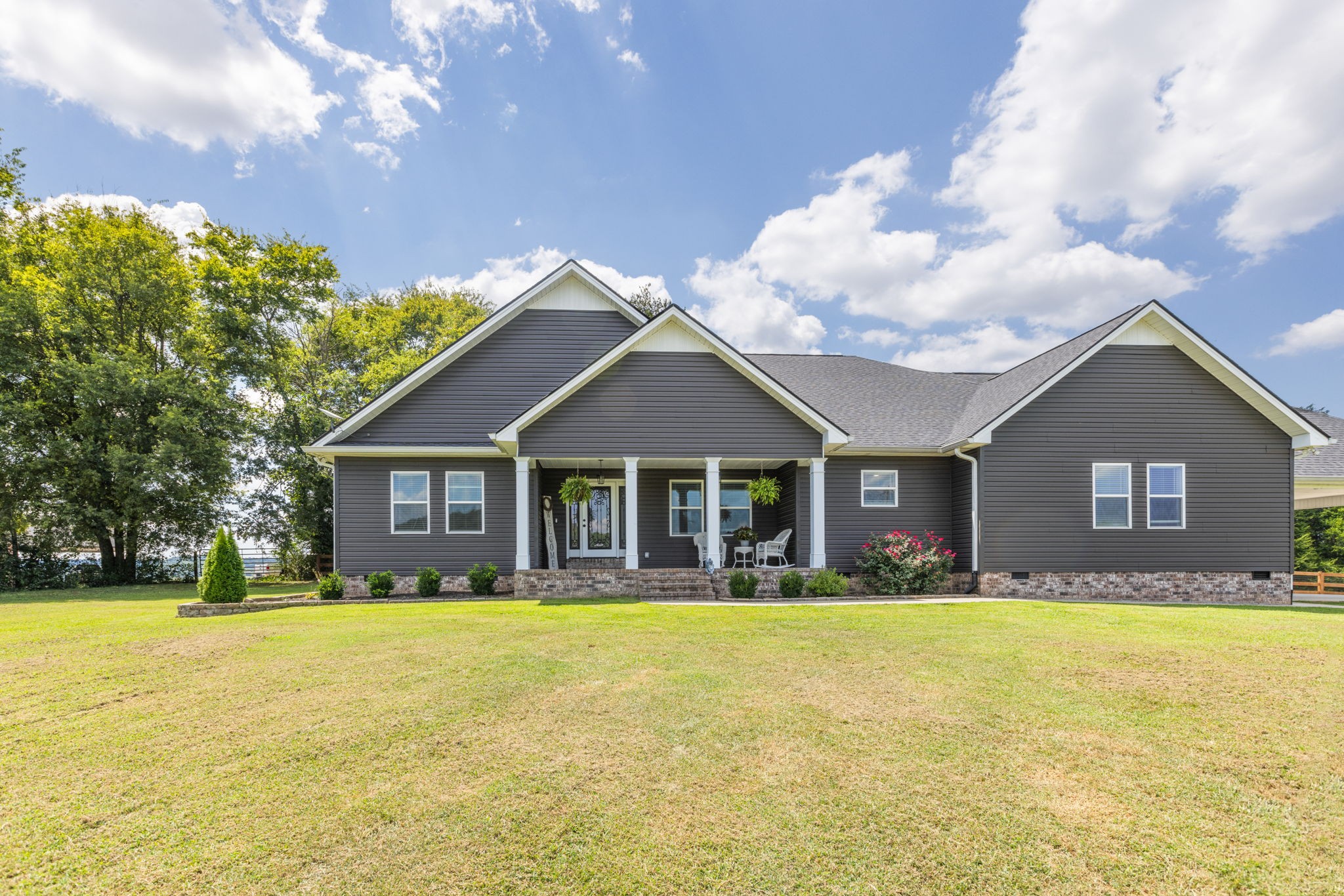 3030 Cherry Corner Road Cornersville, TN 37047 - Photo 63 of 66 a front view of house with yard and trees around