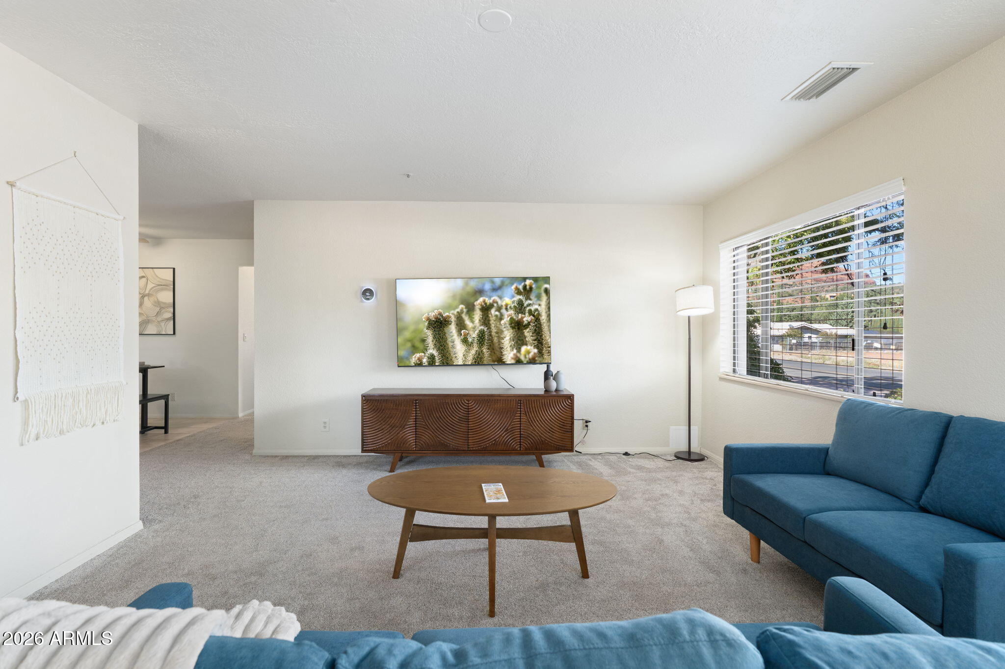 615 Jordan Road Sedona, AZ 86336 - Photo 12 of 82 a living room with furniture and a window