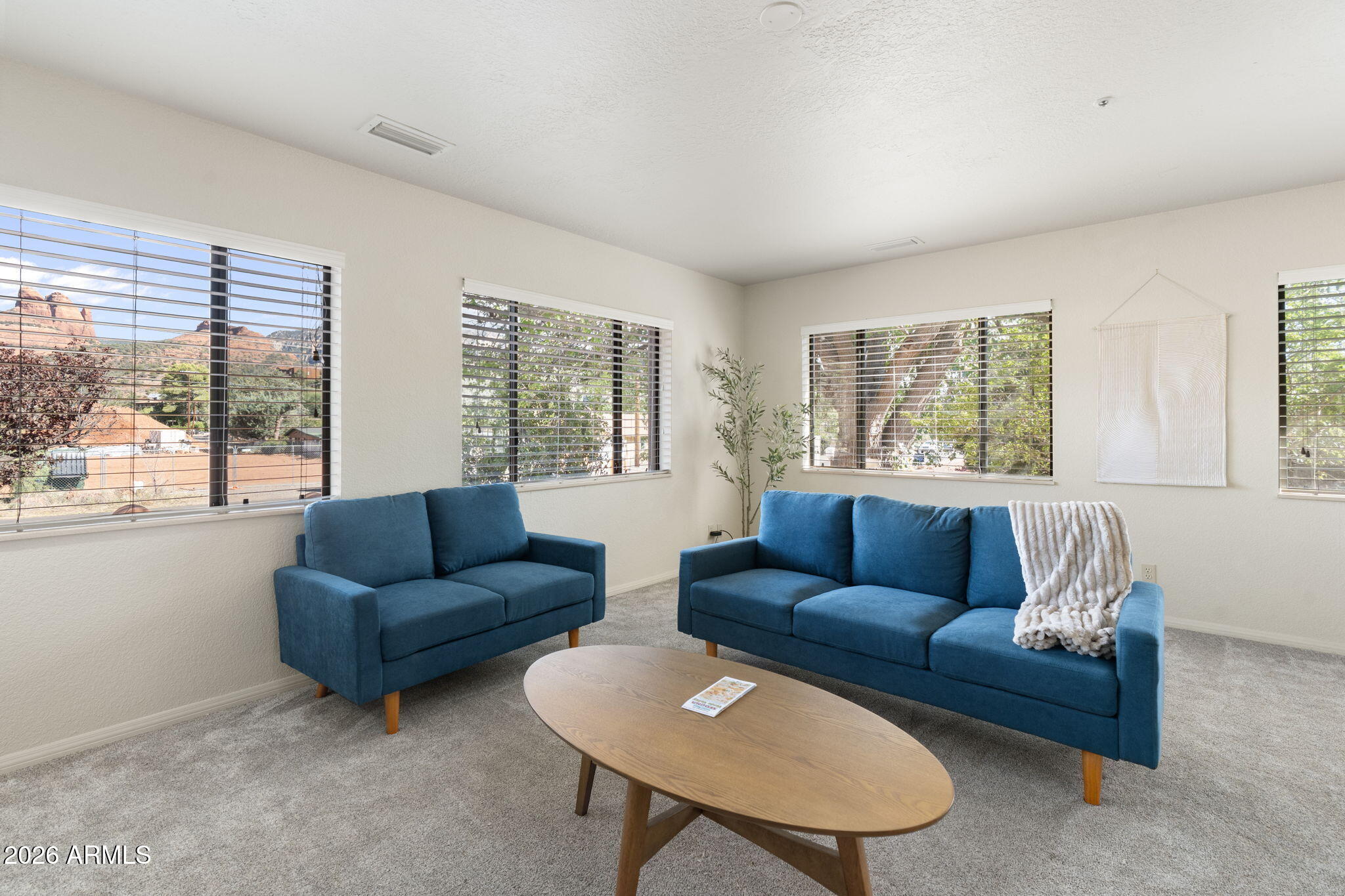 615 Jordan Road Sedona, AZ 86336 - Photo 15 of 82 a living room with furniture and a window