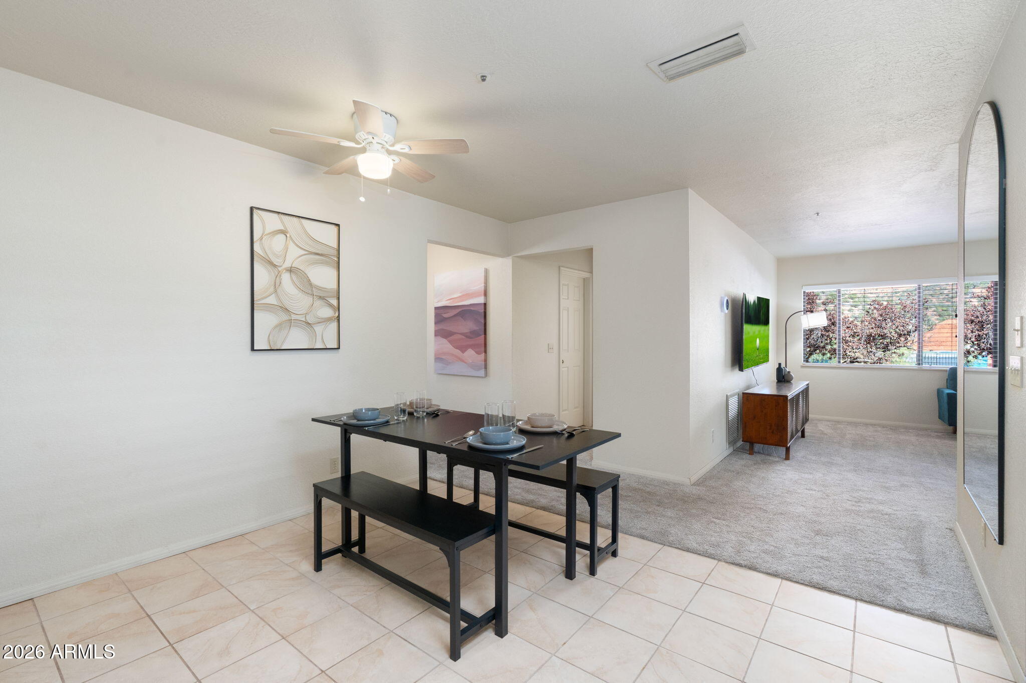 615 Jordan Road Sedona, AZ 86336 - Photo 16 of 82 a view of a dining room with furniture and a potted plant