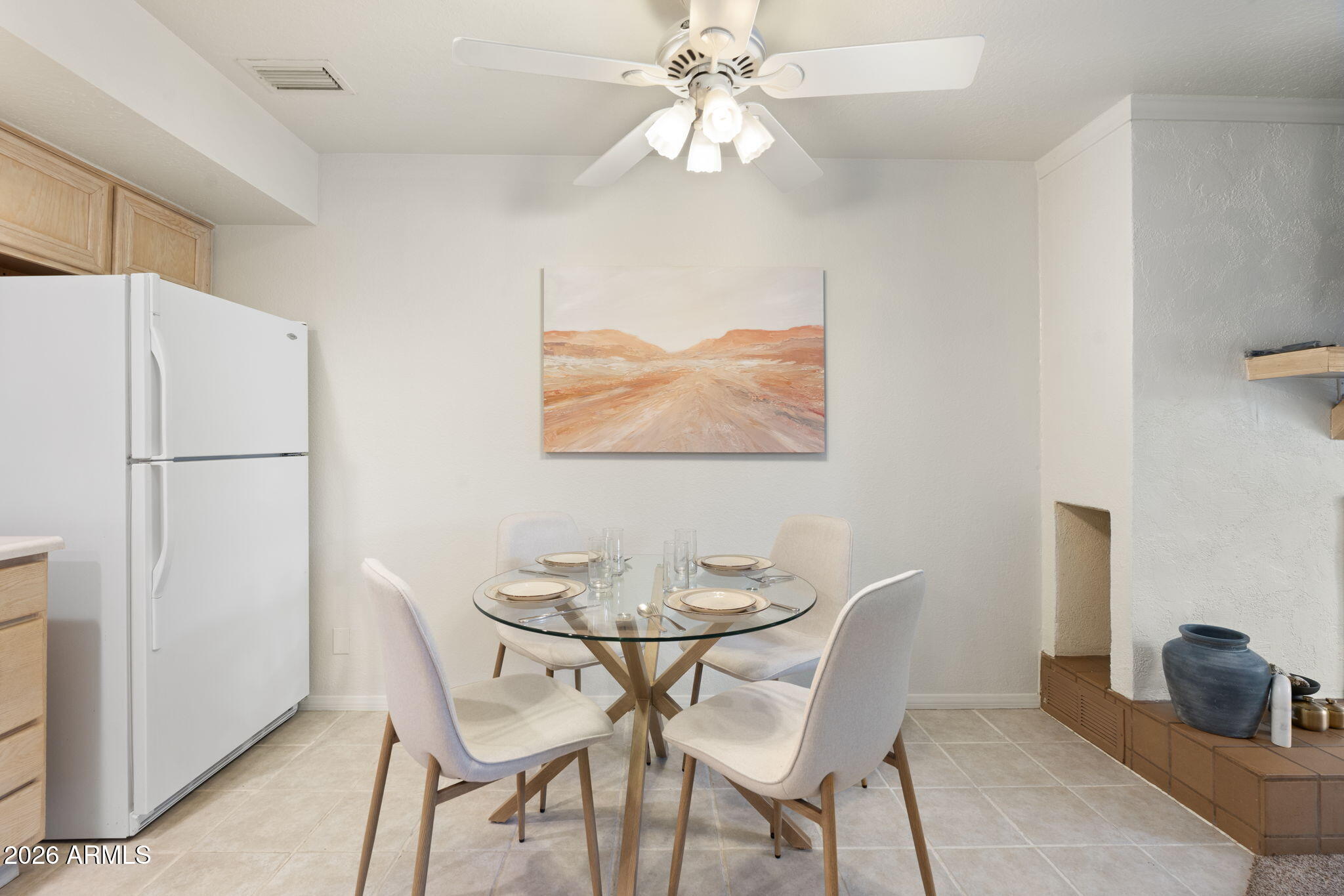 615 Jordan Road Sedona, AZ 86336 - Photo 36 of 82 a dining room with furniture and a chandelier fan
