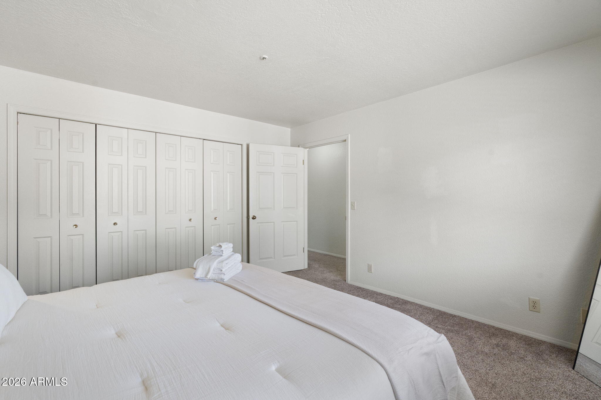 615 Jordan Road Sedona, AZ 86336 - Photo 41 of 82 a bedroom with a bed and a closet