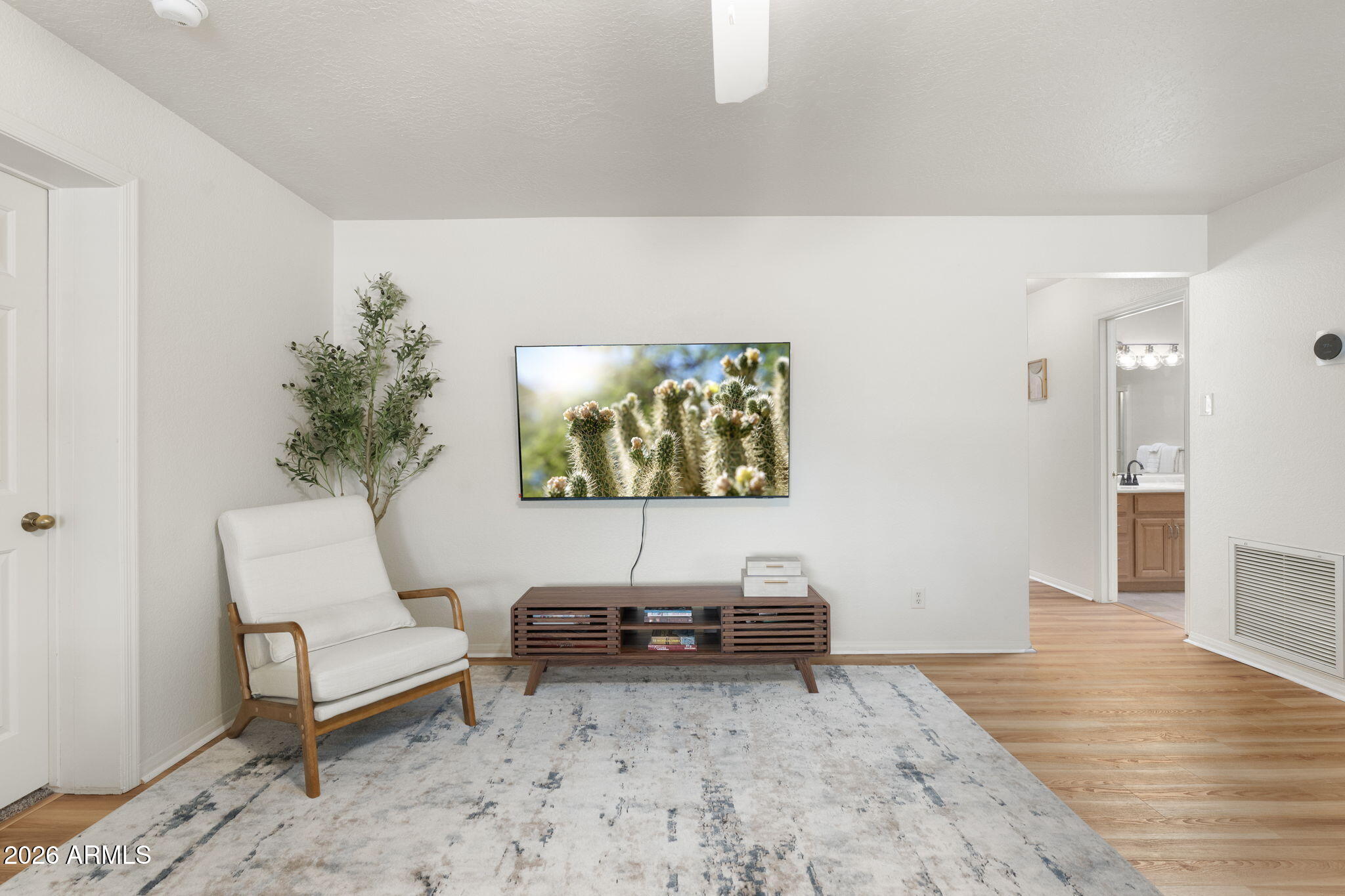 615 Jordan Road Sedona, AZ 86336 - Photo 48 of 82 a living room with furniture and a wooden floor