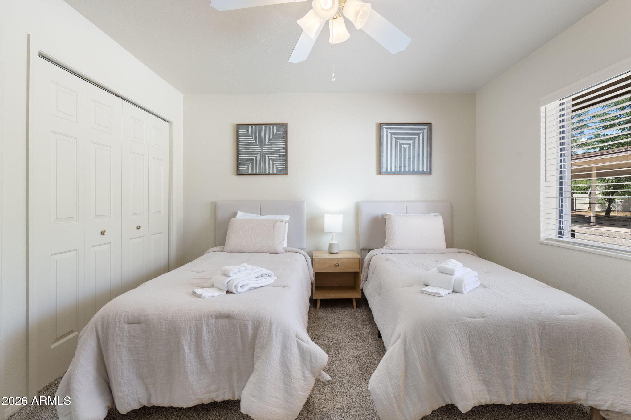 615 Jordan Road Sedona, AZ 86336 - Photo 54 of 82 a bedroom with a bed and a window