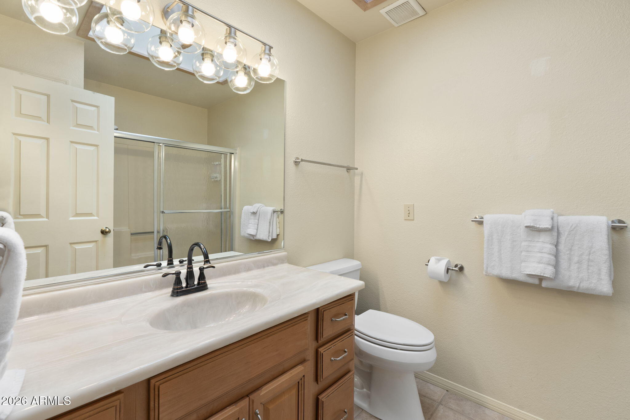 615 Jordan Road Sedona, AZ 86336 - Photo 56 of 82 a bathroom with a sink a toilet and a mirror