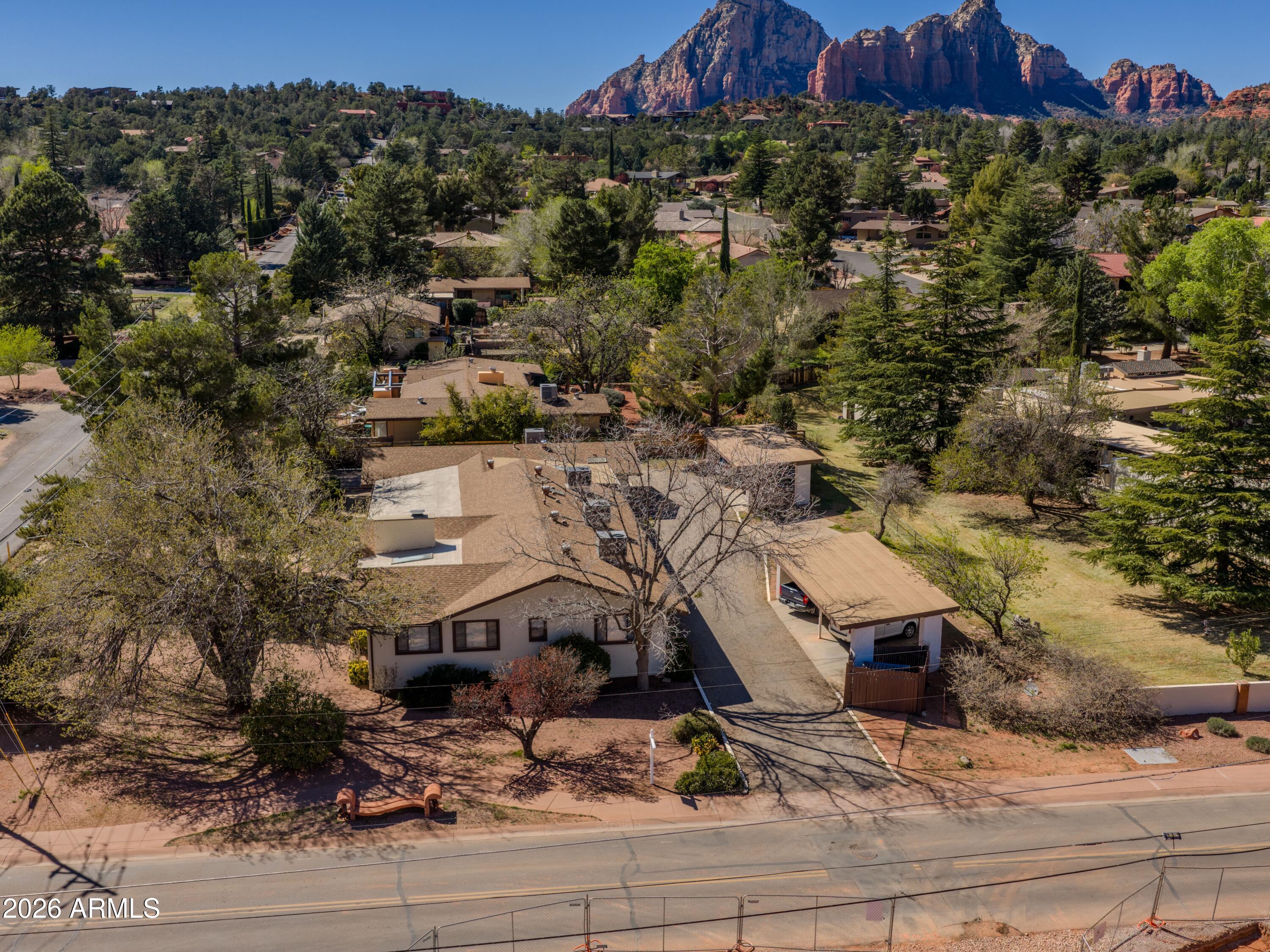 615 Jordan Road Sedona, AZ 86336 - Photo 6 of 88 an aerial view of a house with a yard