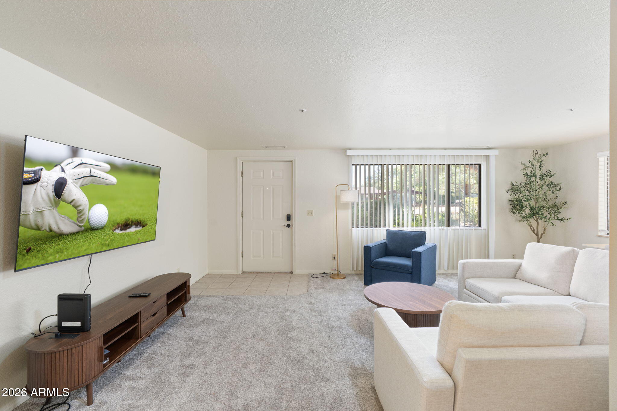 615 Jordan Road Sedona, AZ 86336 - Photo 72 of 88 a living room with furniture and a flat screen tv