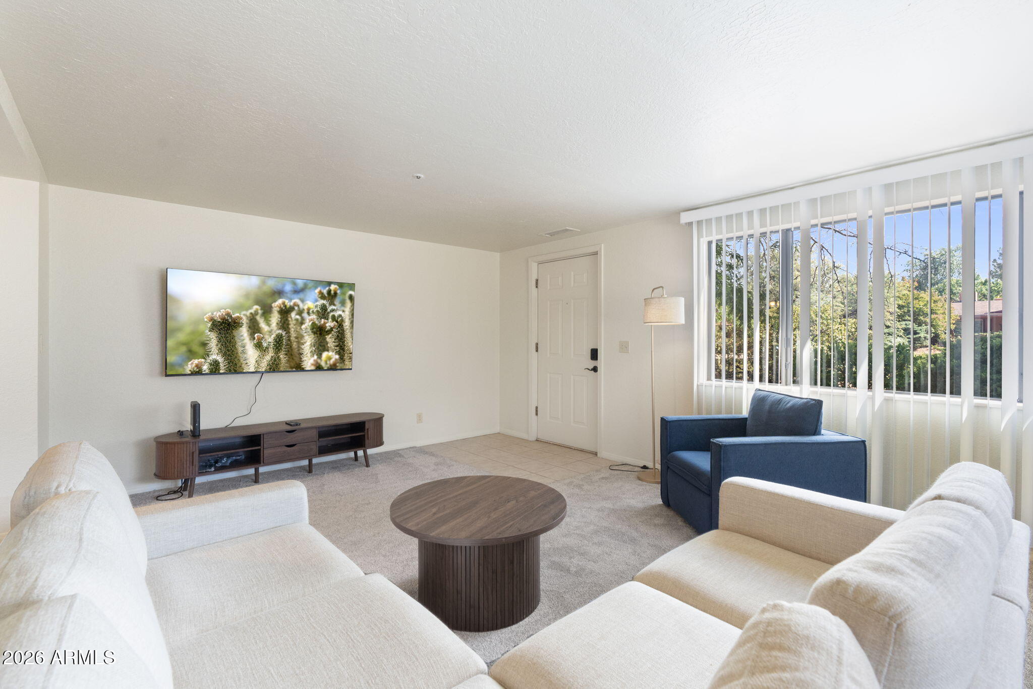 615 Jordan Road Sedona, AZ 86336 - Photo 75 of 88 a living room with furniture and a large window