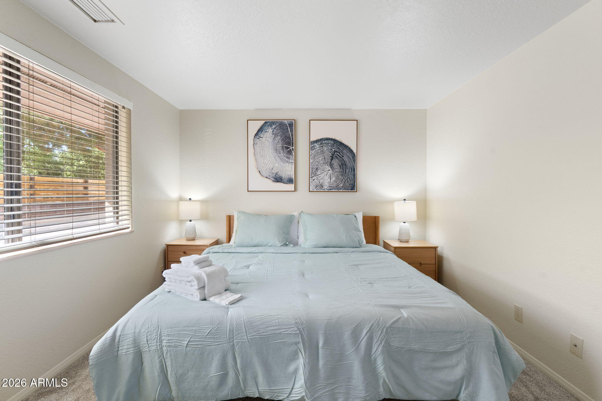 615 Jordan Road Sedona, AZ 86336 - Photo 81 of 88 a bedroom with a bed and a window