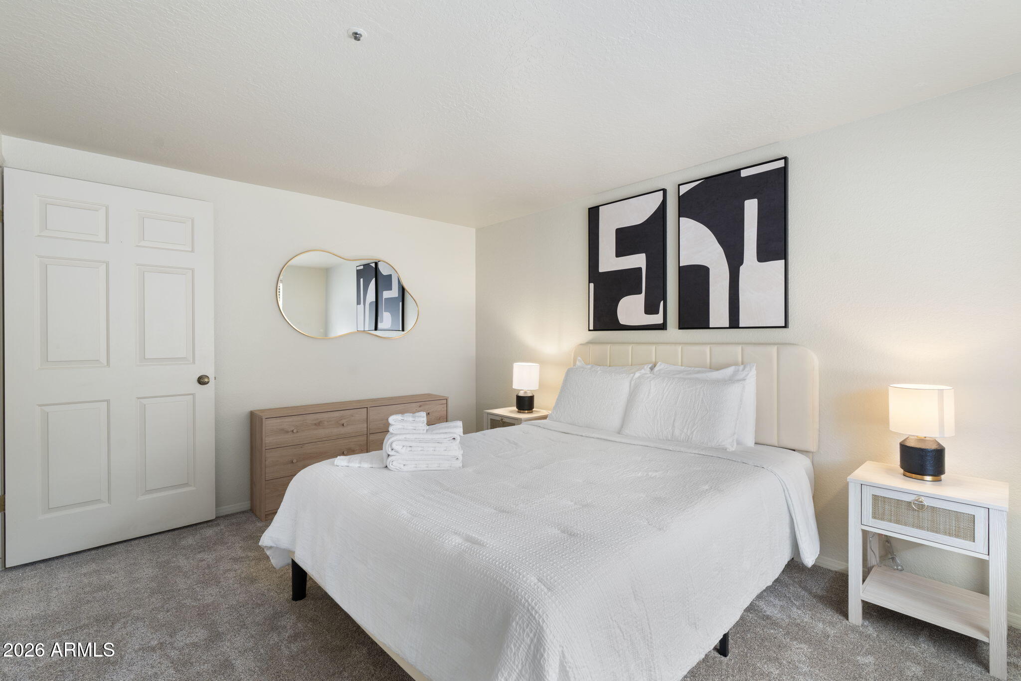 615 Jordan Road Sedona, AZ 86336 - Photo 83 of 88 a bedroom with a bed and a lamp