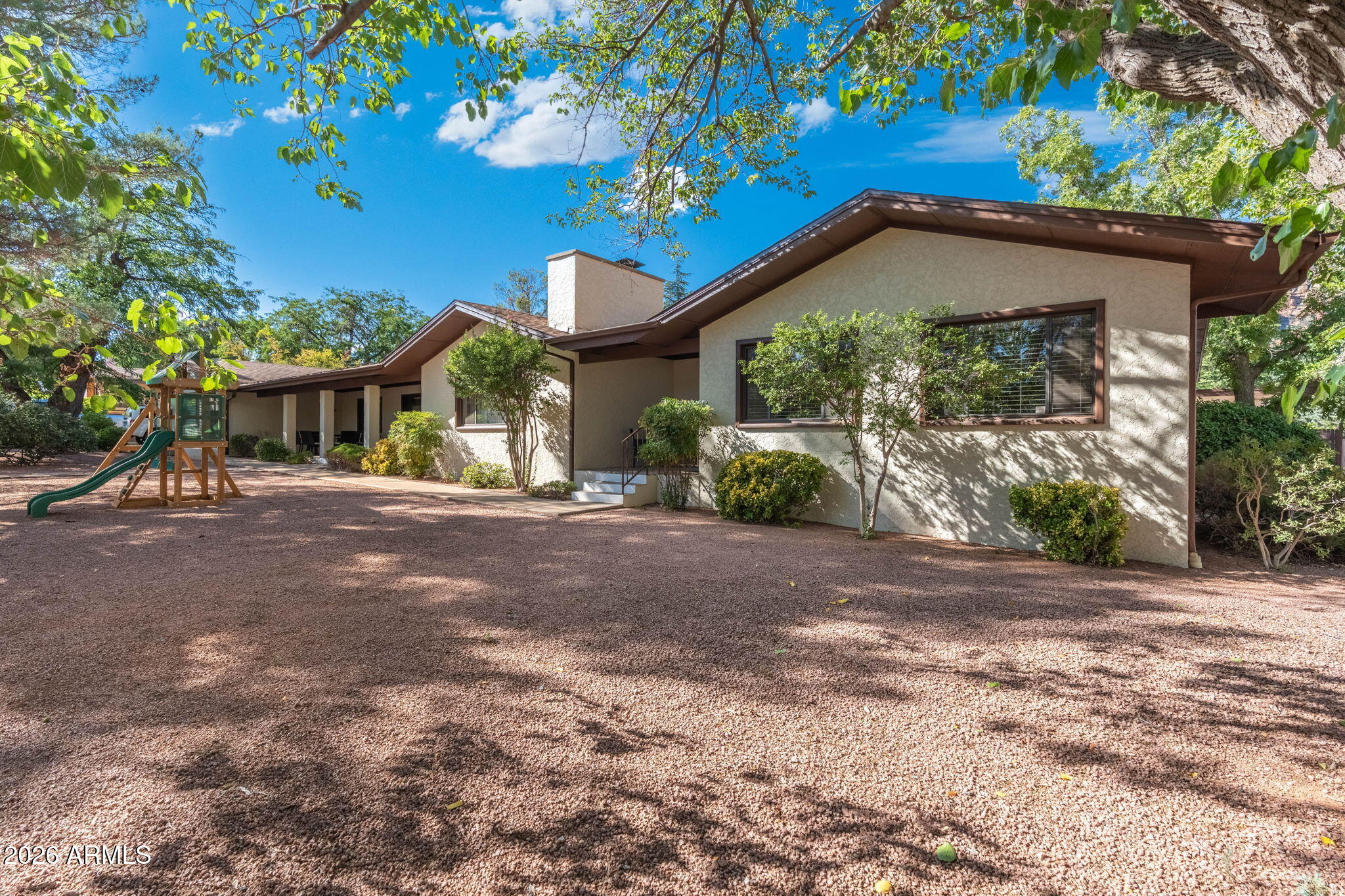615 Jordan Road Sedona, AZ 86336 - Photo 87 of 88 a view of a house with a tree