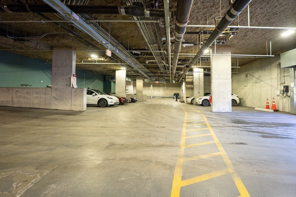 180 Telford Street, Unit 605 Boston, MA 02135 - Photo 20 of 24 a view of a parking garage