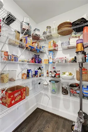 a bathroom with a sink double vanity and a mirror