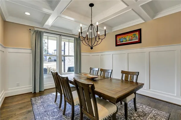 a en suite bathroom with double sink and a large mirror