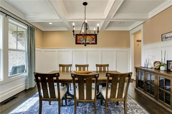 a bathroom with a double vanity sink a mirror and a shower