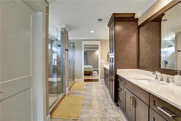 a bedroom with a bed and a fireplace