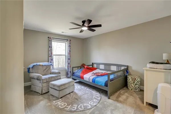 a view of a building with sitting area