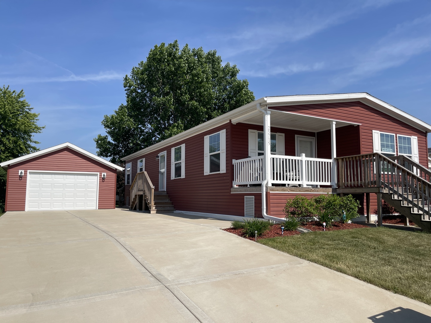 25715 Olympic Drive Monee, IL 60449 - Photo 1 of 19 a front view of a house with a yard