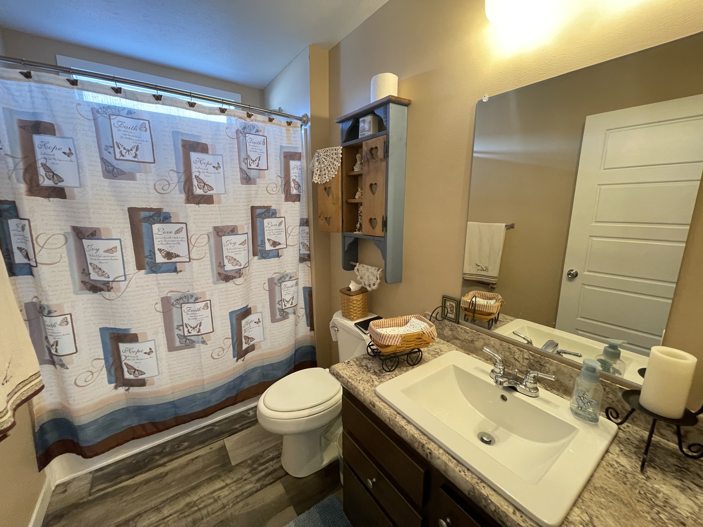 25715 Olympic Drive Monee, IL 60449 - Photo 12 of 19 a bathroom with a sink toilet and shower
