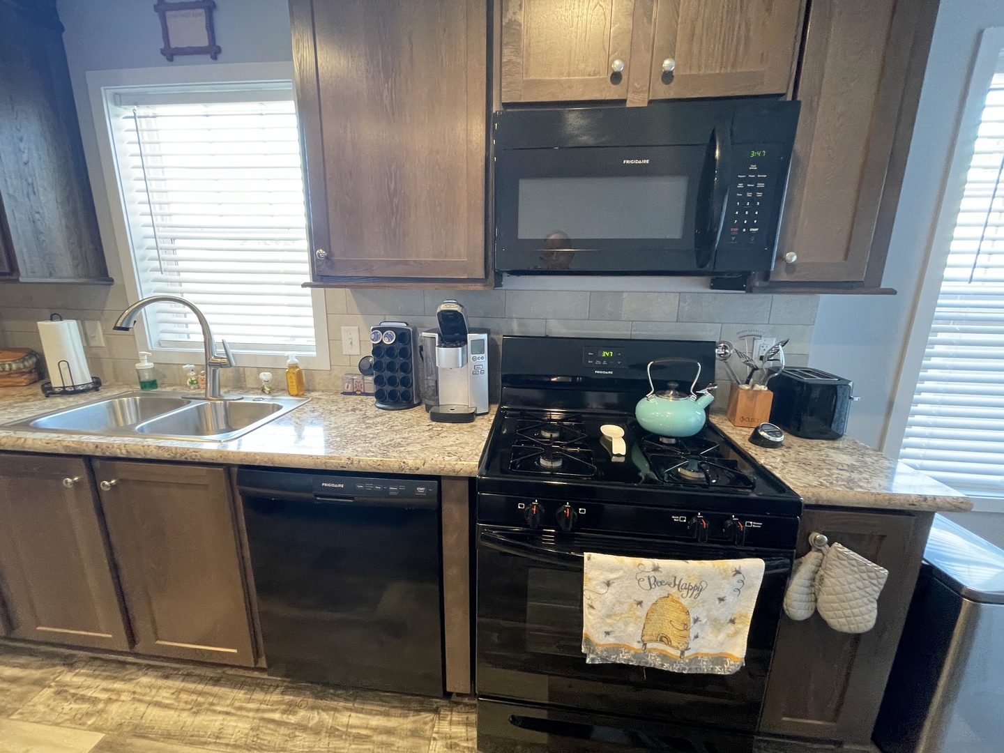 25715 Olympic Drive Monee, IL 60449 - Photo 13 of 19 a kitchen with a sink and cabinets
