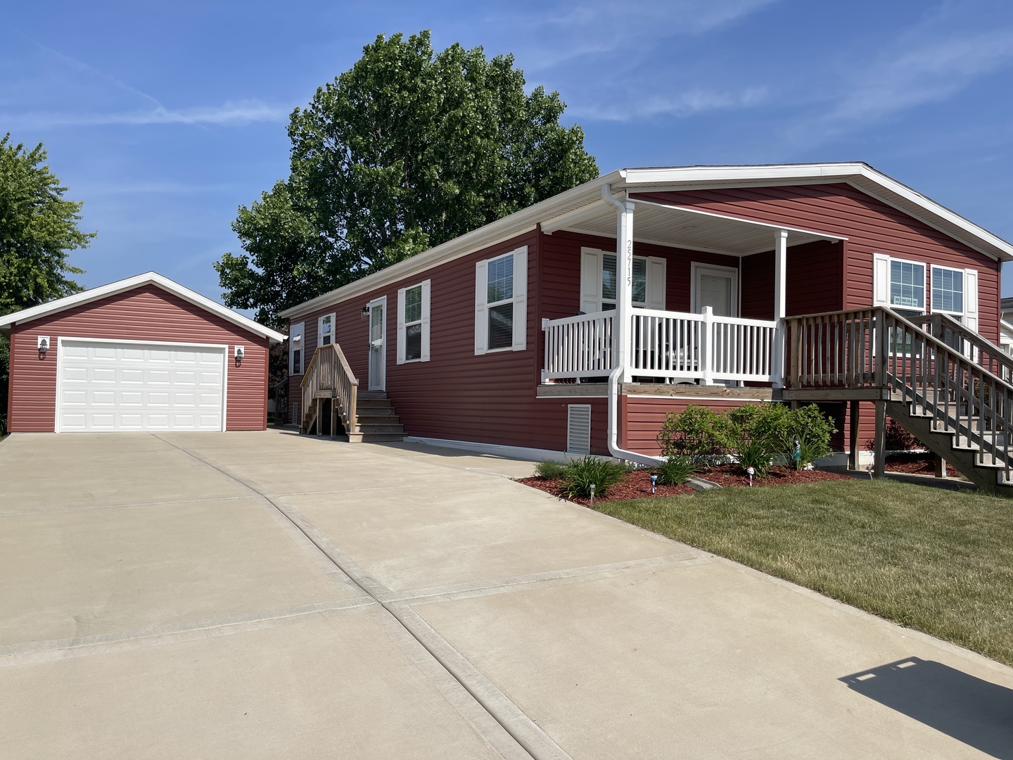 25715 Olympic Drive Monee, IL 60449 - Photo 19 of 19 a front view of a house with a yard