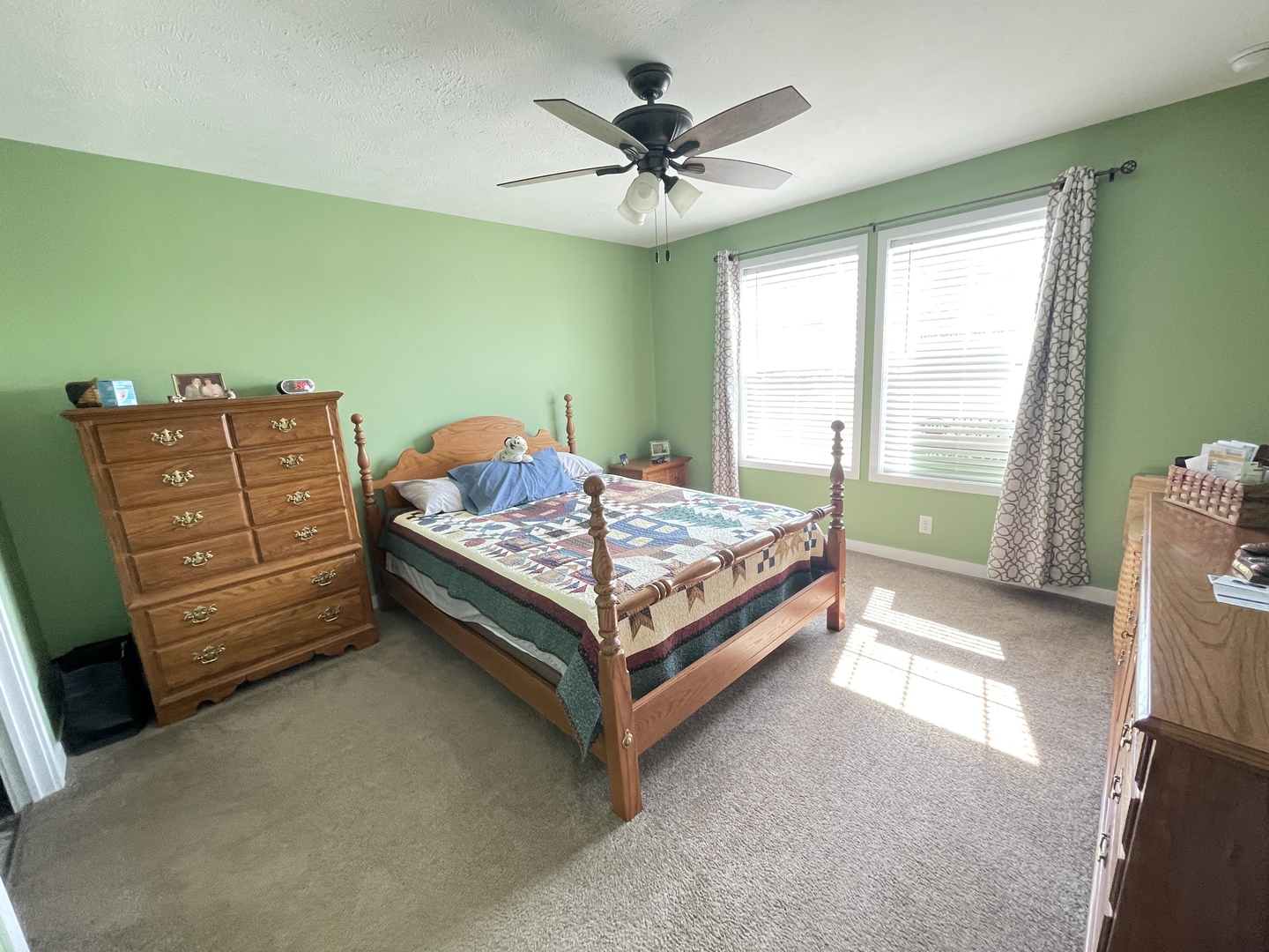 25715 Olympic Drive Monee, IL 60449 - Photo 10 of 19 a bed sitting in a room next to a window