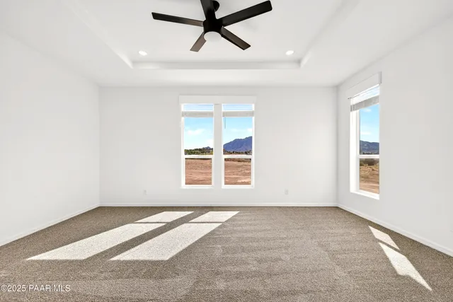 a spacious bathroom with a double vanity sink and a mirror