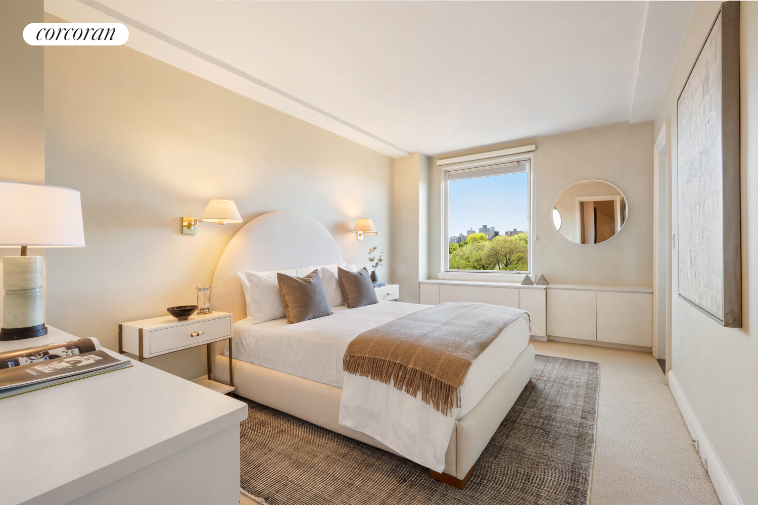 1158 5th Avenue, Unit 9/10A Manhattan, NY 10128 - Photo 13 of 18 a bedroom with two beds and a window