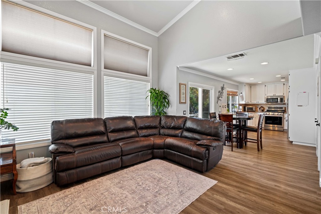 25510 Chisom Lane Stevenson Ranch, CA 91381 - Photo 11 of 53 a living room with furniture and wooden floor