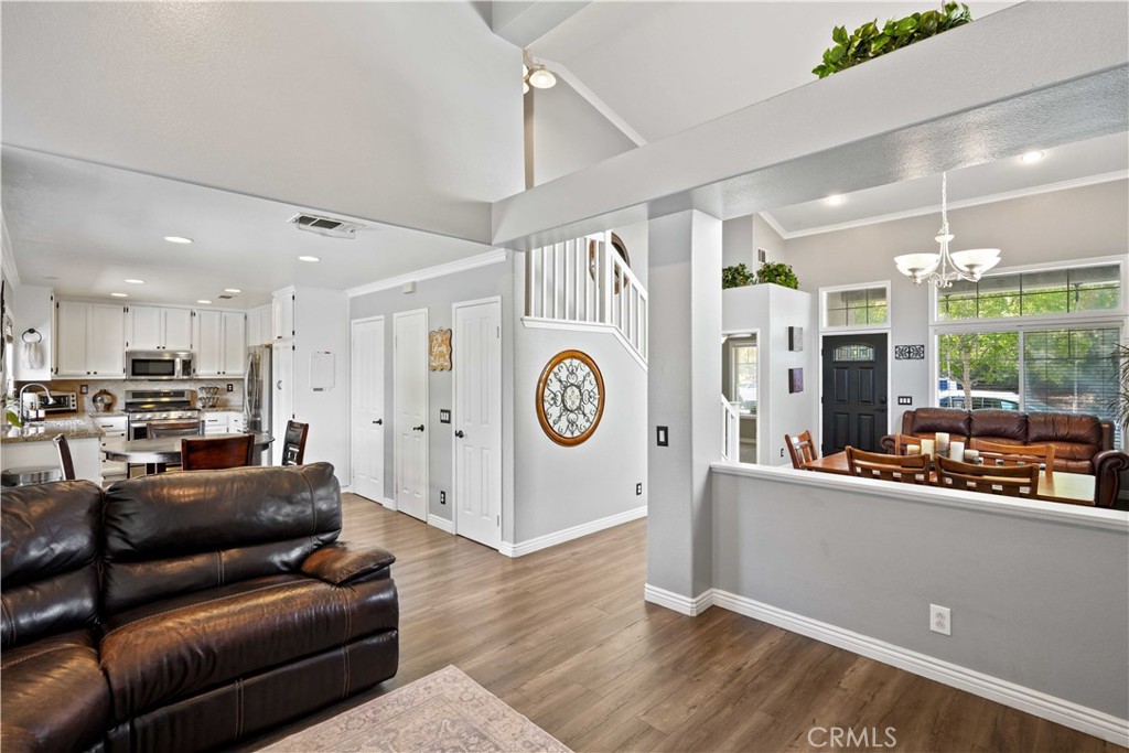 25510 Chisom Lane Stevenson Ranch, CA 91381 - Photo 12 of 53 a living room with furniture and a large window