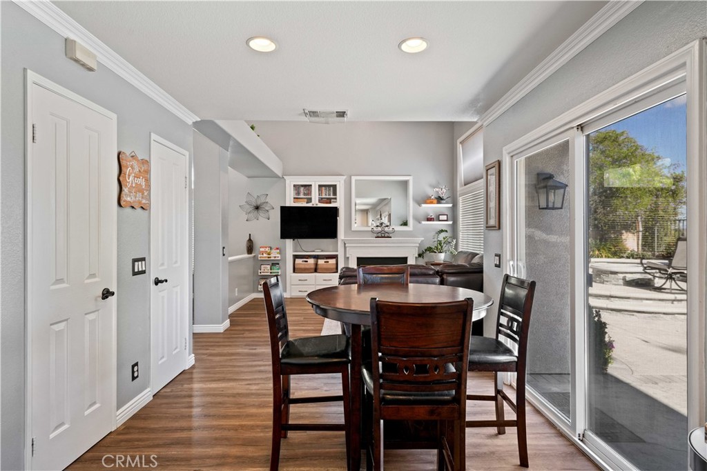 25510 Chisom Lane Stevenson Ranch, CA 91381 - Photo 14 of 53 a view of a dining room with furniture window and wooden floor