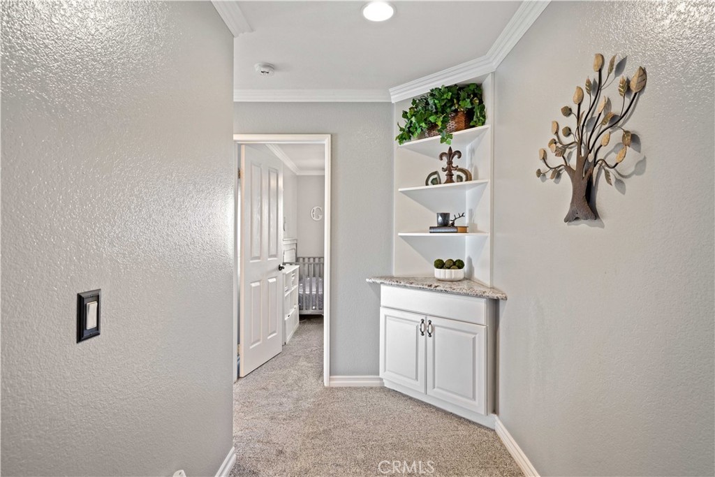 25510 Chisom Lane Stevenson Ranch, CA 91381 - Photo 26 of 53 a room that has a bed and a window in it