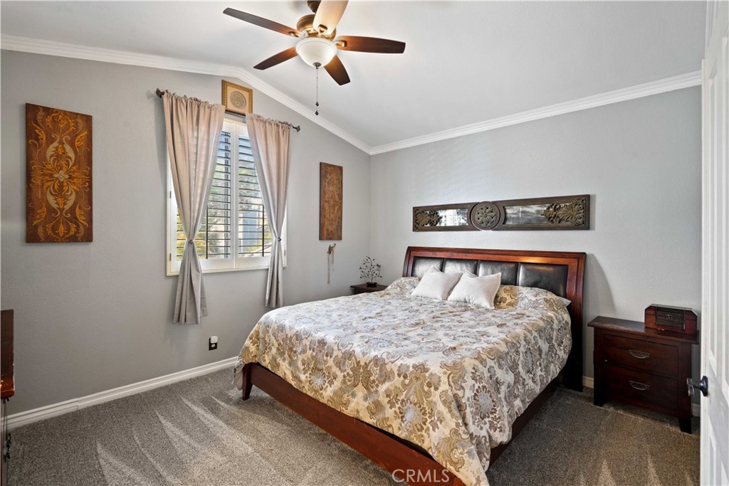 25510 Chisom Lane Stevenson Ranch, CA 91381 - Photo 27 of 53 a bedroom with a bed and window
