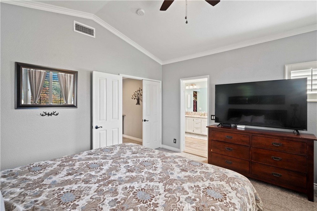 25510 Chisom Lane Stevenson Ranch, CA 91381 - Photo 29 of 53 a bedroom with a bed and a flat screen tv